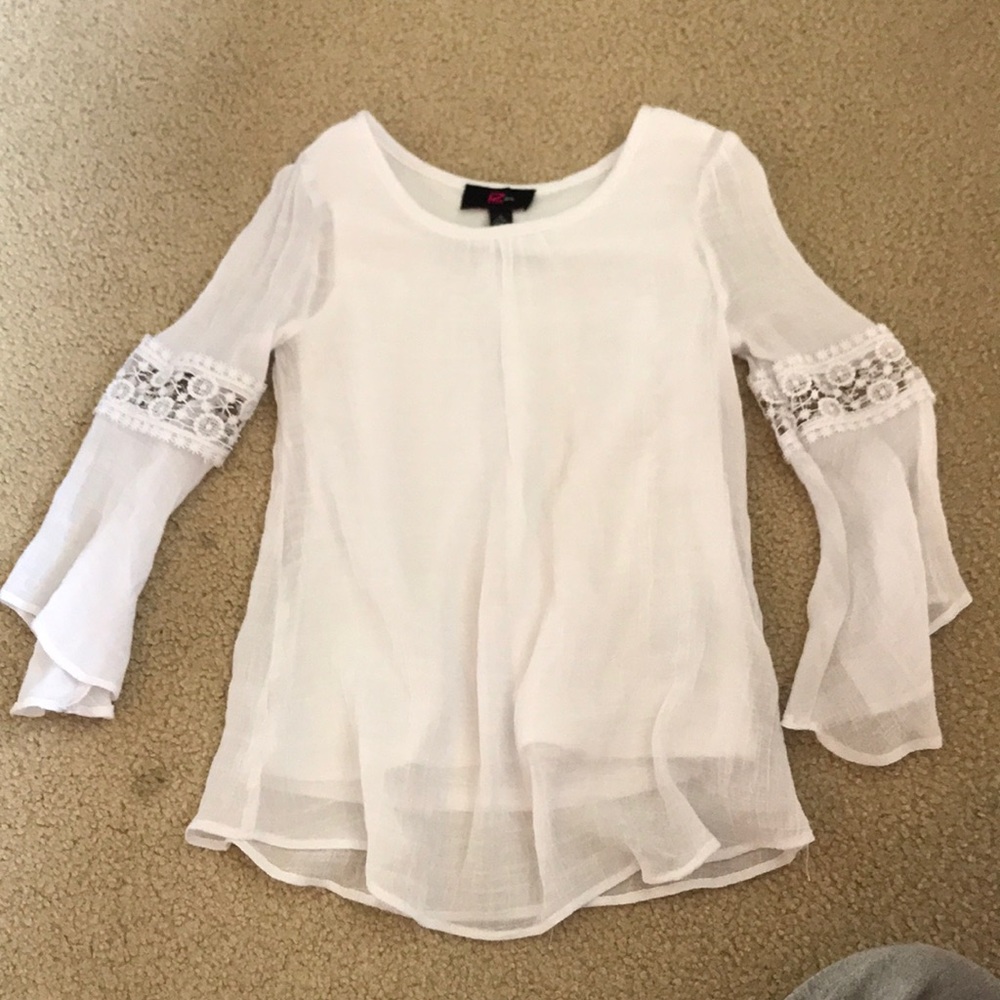 White thin long sleeve shirt.